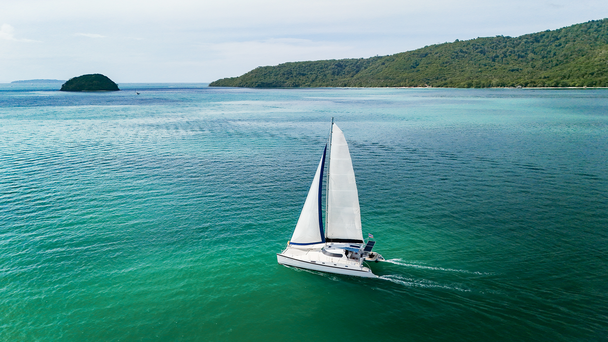 Shared Luxury Sailing on a Modern Catamaran